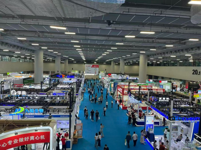 Busy exhibition hall during CMEF 2026 with visitors walking between booths