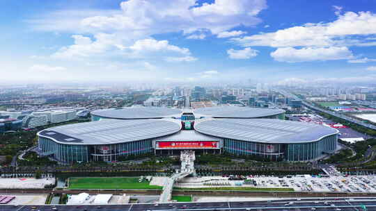 Aerial view of the National Exhibition and Convention Center Shanghai, known for its four-leaf clover design